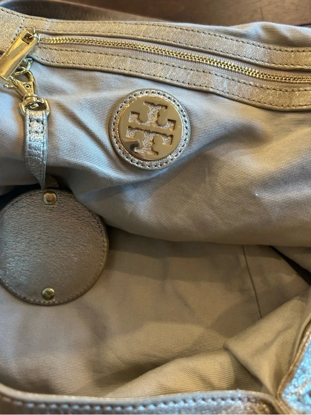 The Tory Burch Shimmer Gold Dean Hobo Bag MSRP 590.00